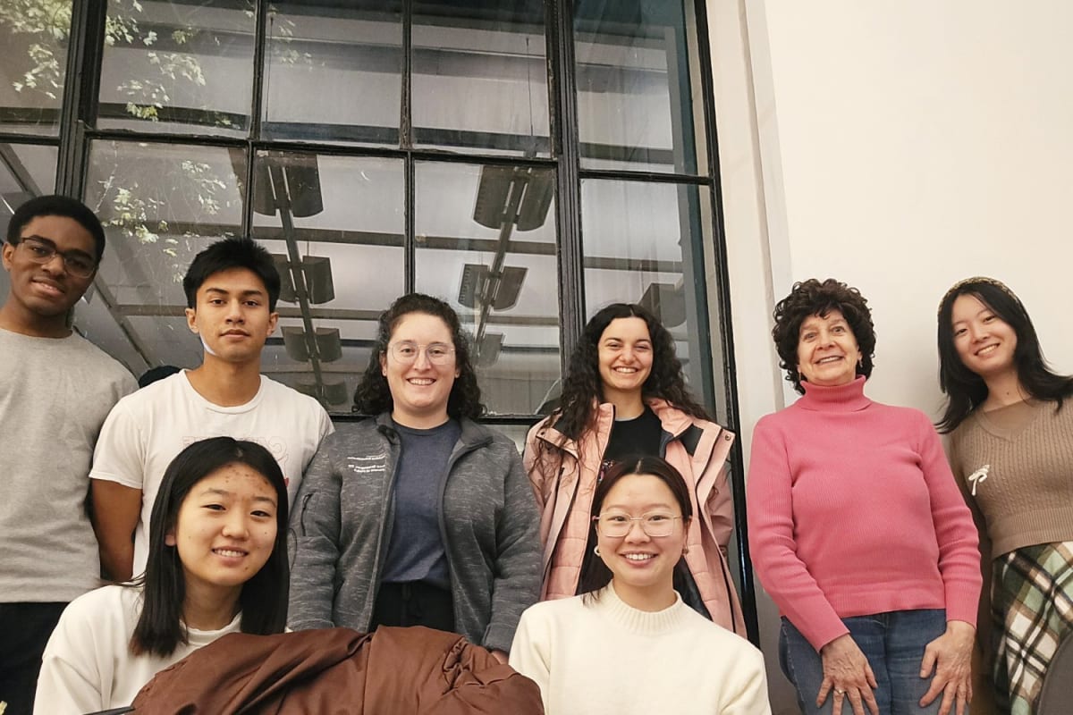 MIT BrainTrust club members smiling together at group gathering for brain injury buddy program