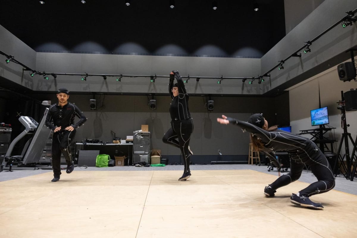 Film student wearing motion capture suit creates virtual character in MIT laboratory