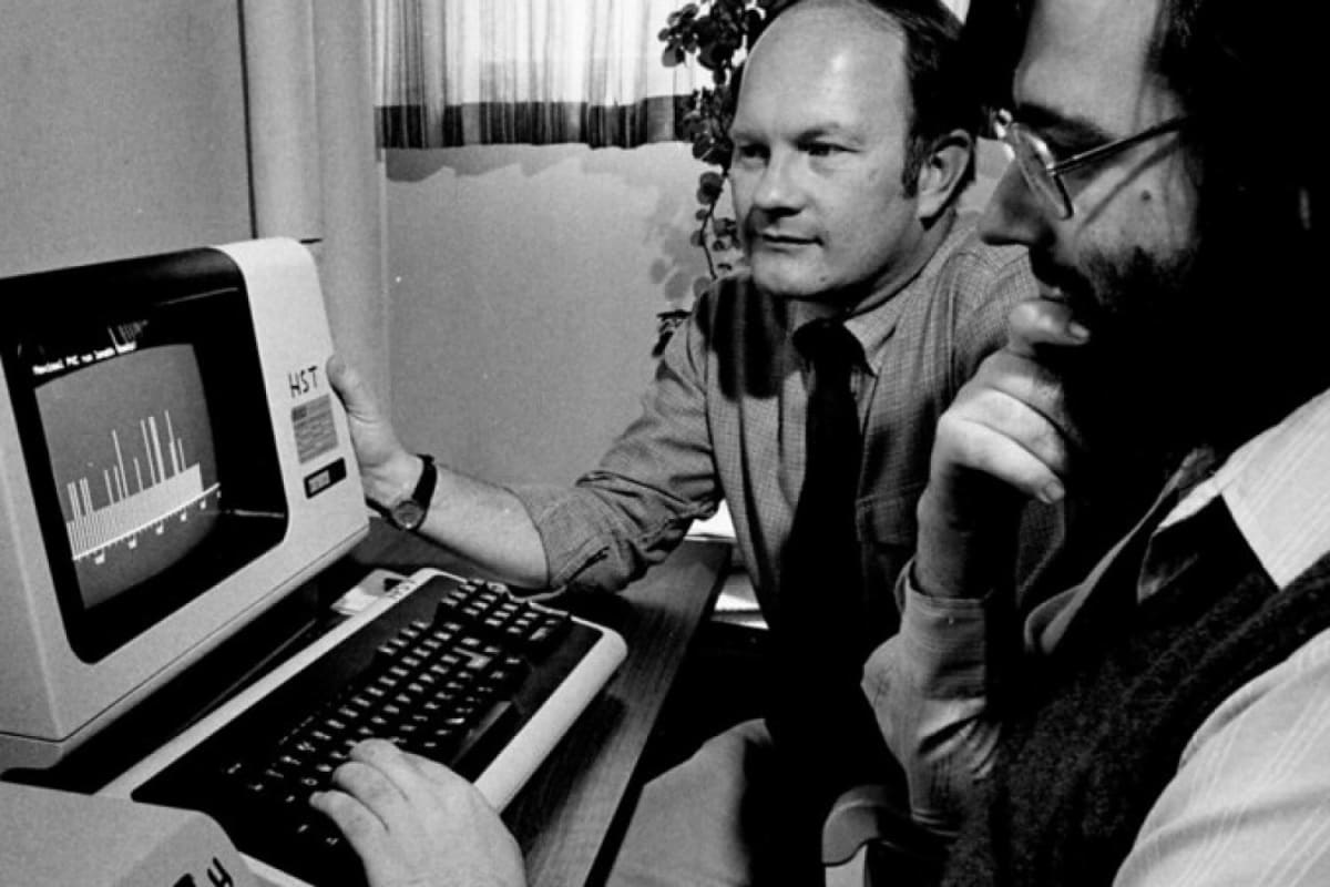 Roger Mark and George Moody, PhysioNet co-founders, standing together at MIT laboratory
