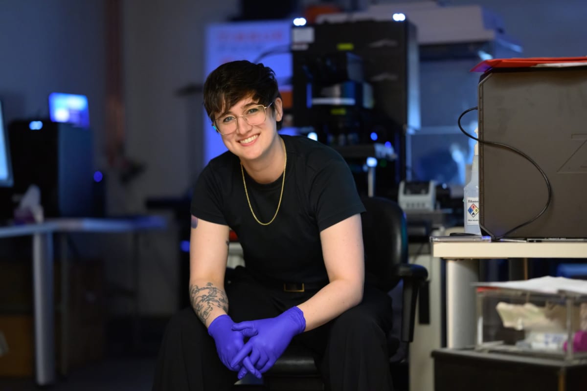 MIT PhD student Shannon Knight working in neuroscience laboratory developing gene therapy treatments
