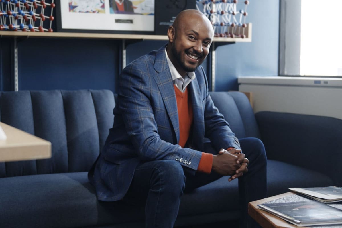 MIT Professor Iwnetim Abate standing in laboratory setting, recognized for mentorship excellence