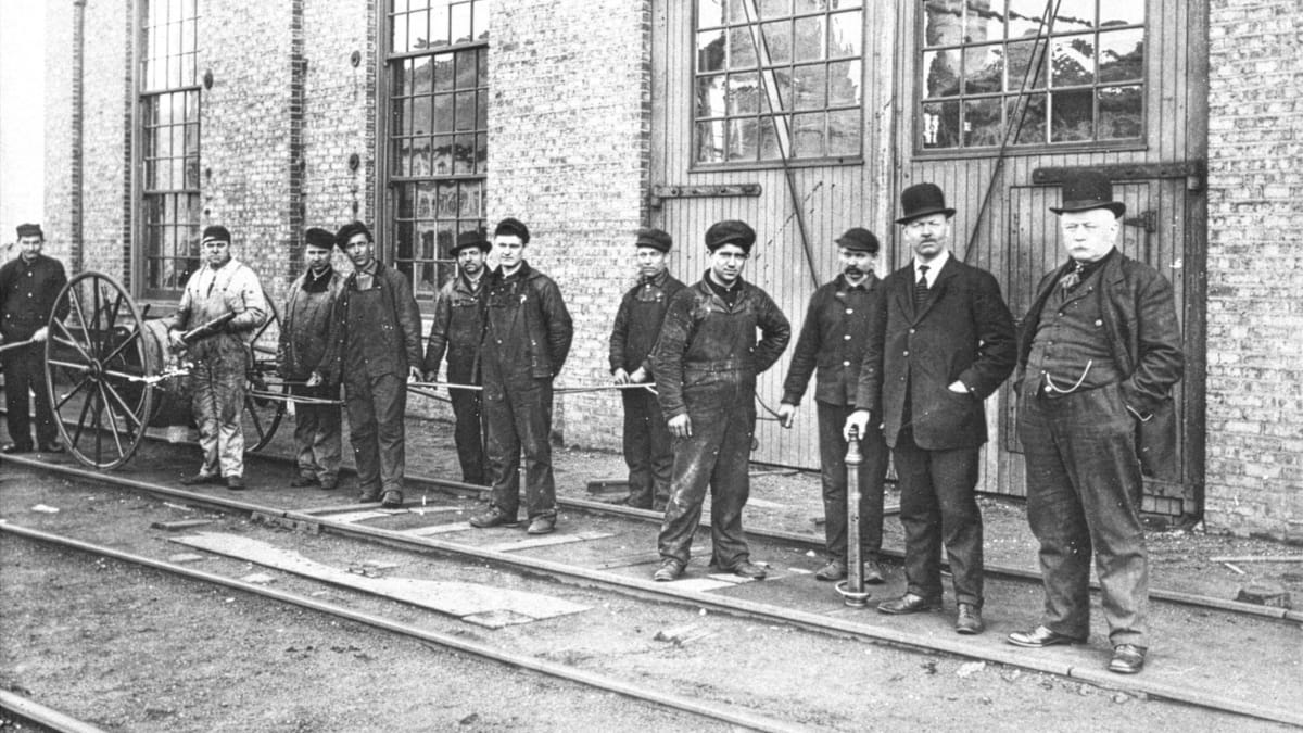 ** Workers exiting Republic Steel plant after shift in post-World War II era Chicago