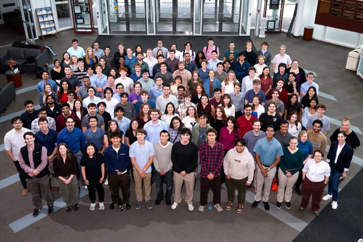 Two graduate student interns working on cybersecurity research at MIT Lincoln Laboratory facility