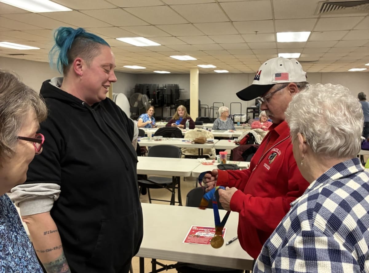 Olympic Gold Medalist Calls Bingo at Rochester Senior Center - Image 2
