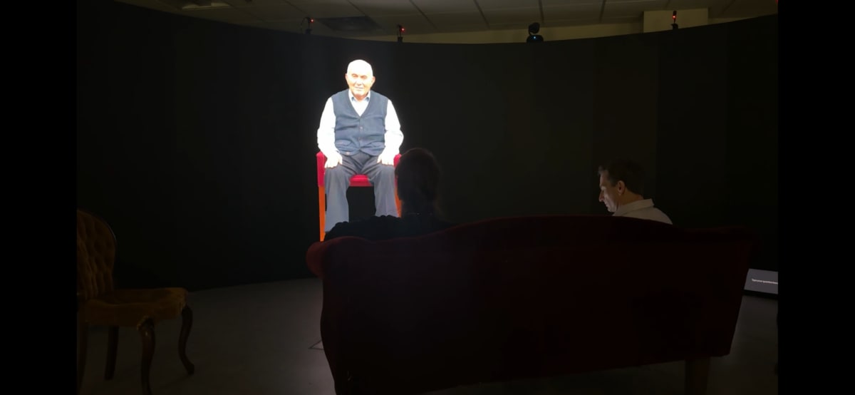 Students at University of St. Thomas viewing Holocaust survivor testimony on large digital visualization wall display