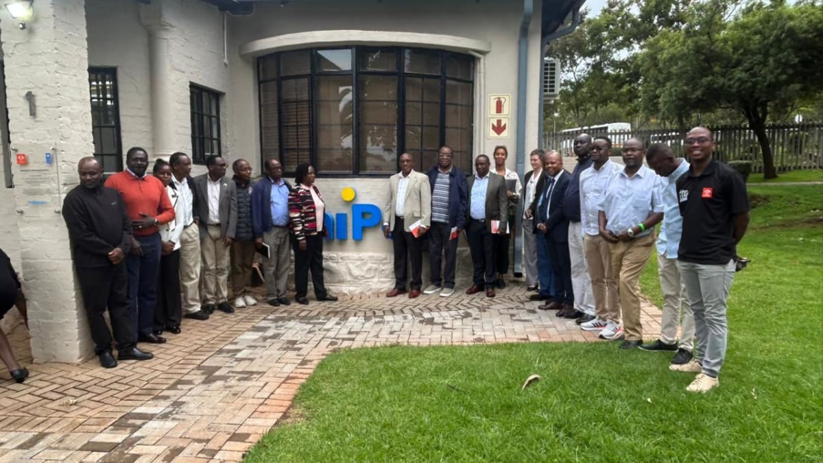 University students working on technology prototypes in modern innovation lab with computers and equipment