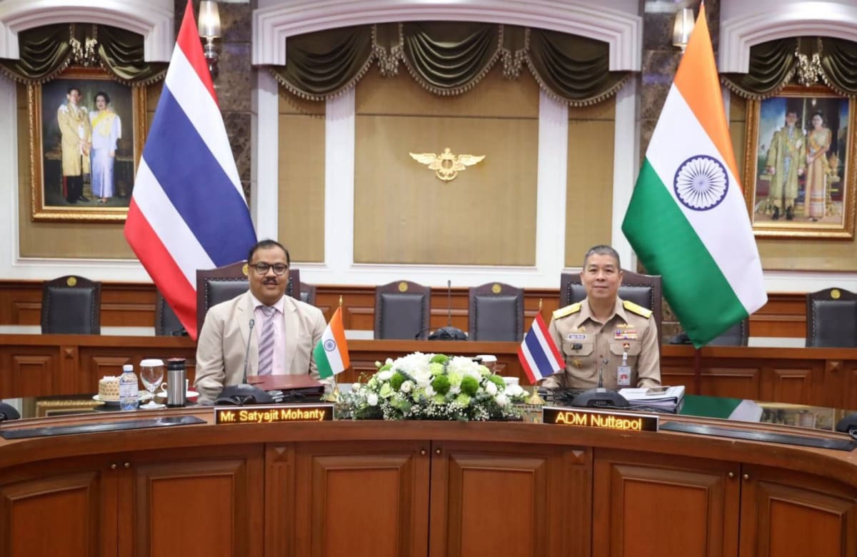 Indian and Thai defense officials shaking hands at bilateral defense dialogue in Bangkok
