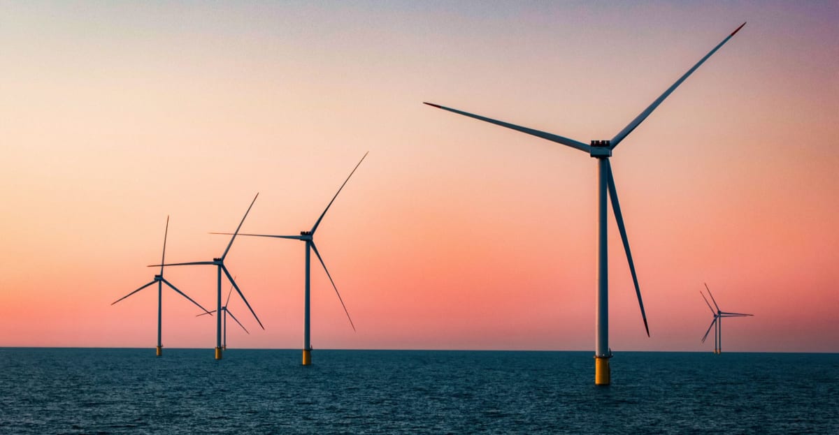 Offshore wind turbines standing in Baltic Sea waters along Poland's coastline generating clean electricity