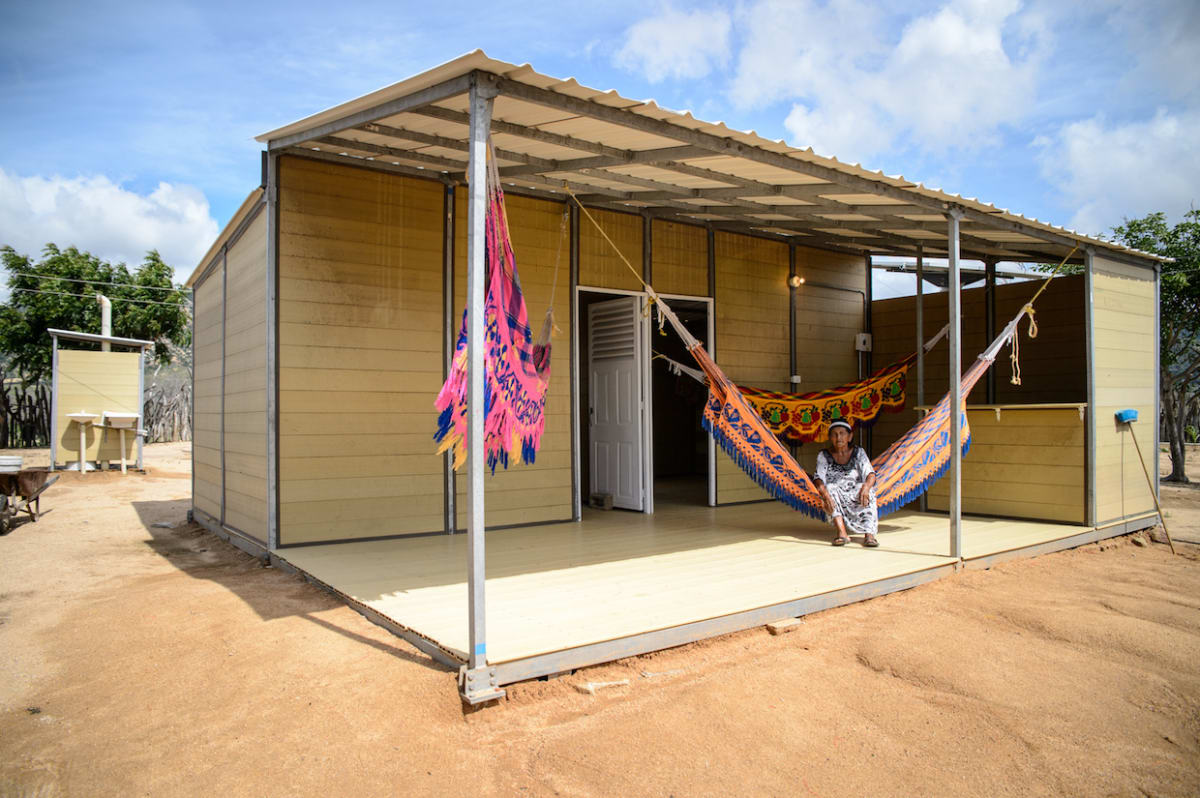 Modular construction panels made from coffee husks and recycled plastic forming a classroom in rural Colombia