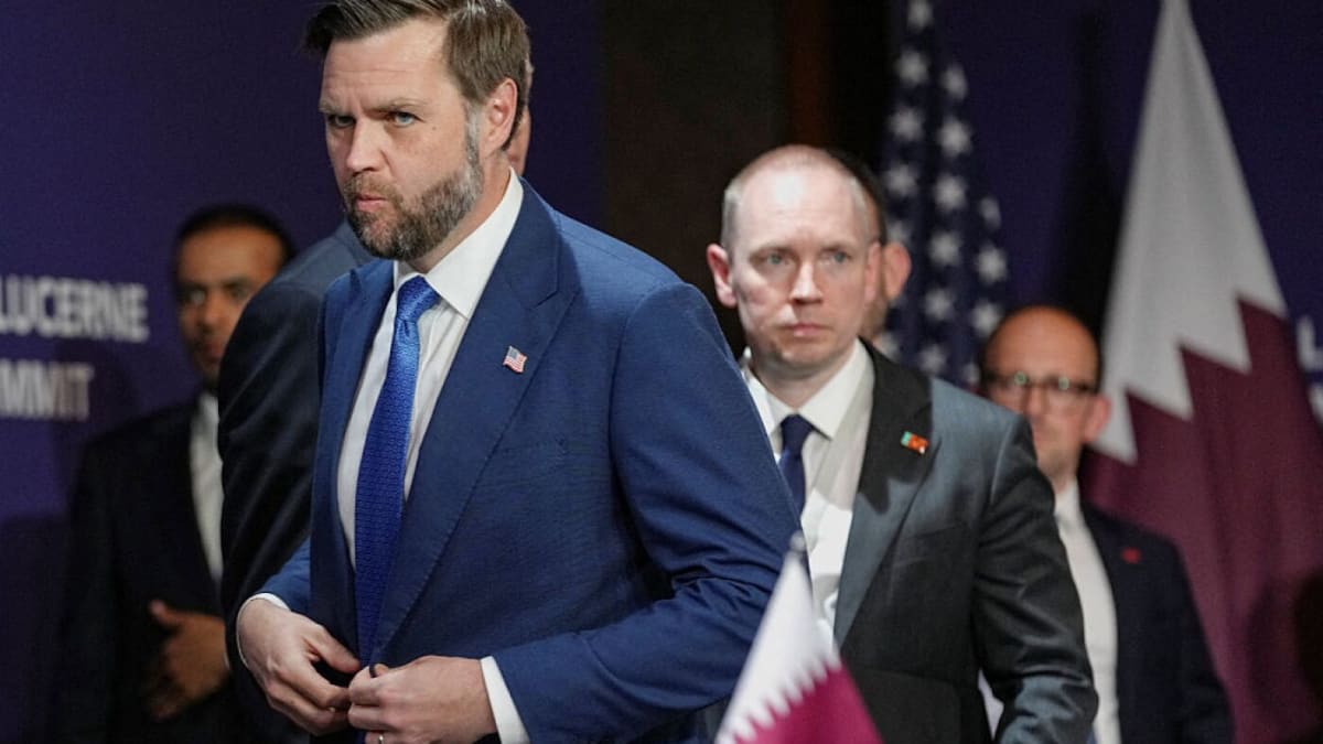 Vice President JD Vance meets with international diplomats at negotiating table in Switzerland overlooking Lake Lucerne