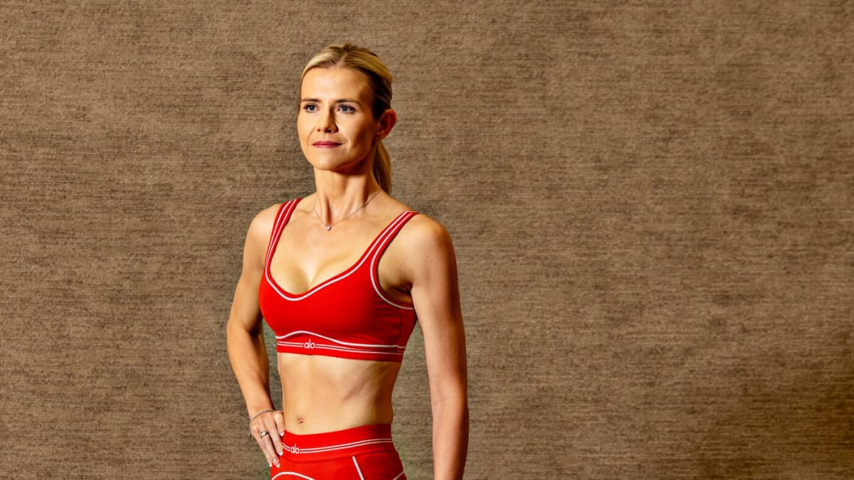 Elizabeth Smart lifting weights in her home gym, building strength and confidence