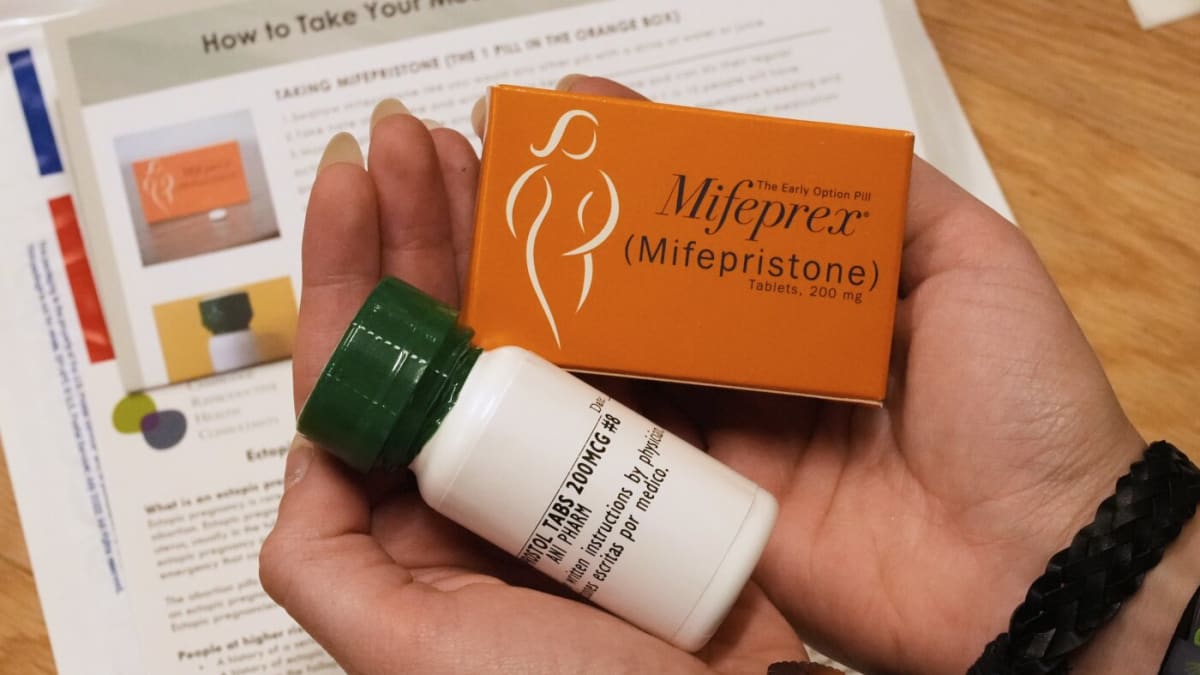 Prototype medication abortion kit box showing clear patient information and instructions