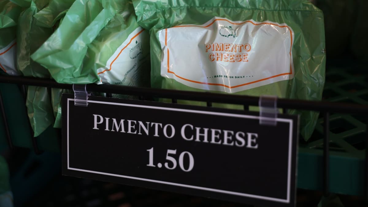 Concession stand menu board at Masters Tournament showing affordable sandwich prices under three dollars