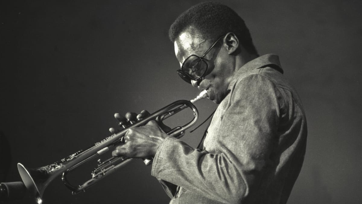 Miles Davis playing trumpet during 1969 concert in New York's Central Park