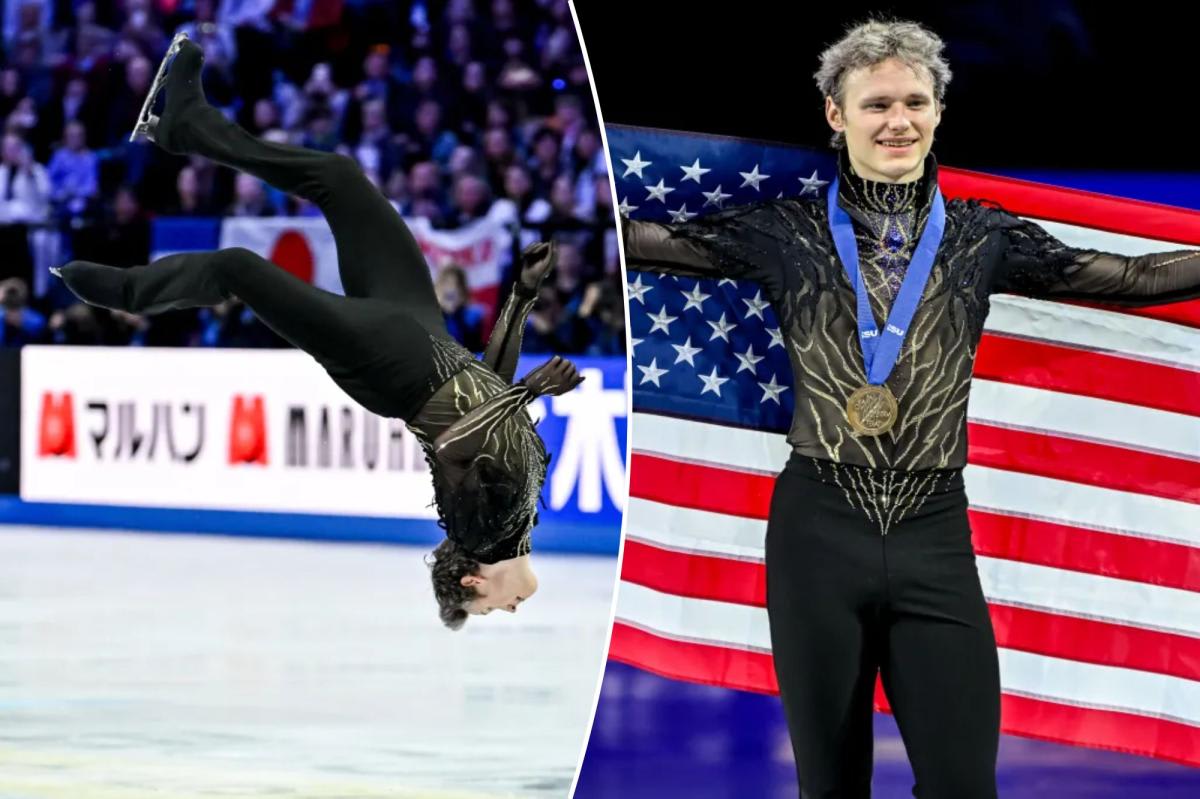Figure skater Ilia Malinin celebrates with American flag after winning world championship gold medal in Prague