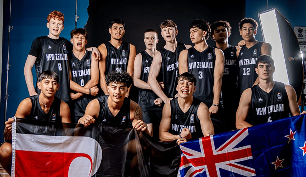 New Zealand under-18 basketball team celebrating bronze medal victory in India tournament