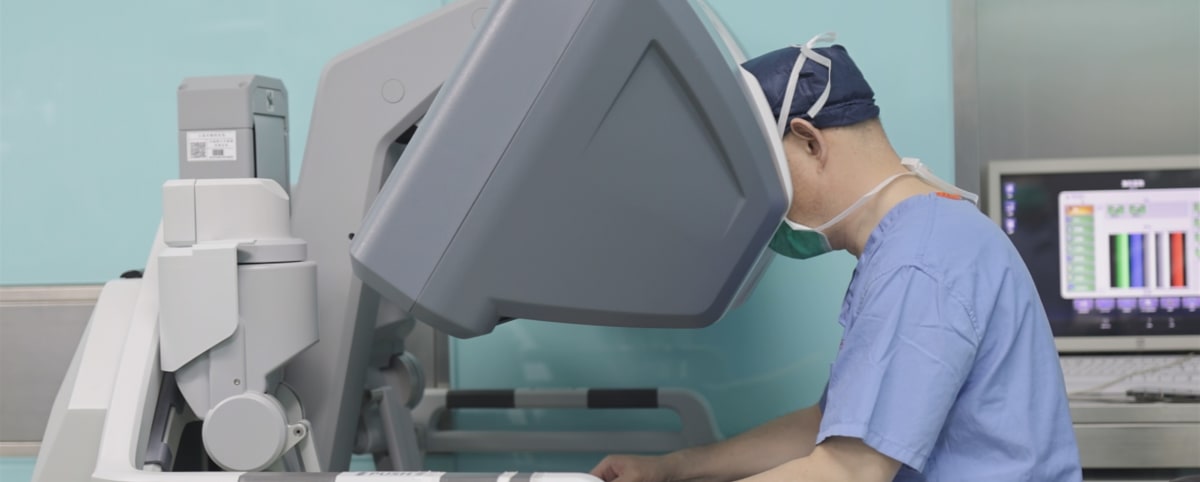 Surgeon operating robotic surgical system for esophageal cancer treatment at Shanghai Chest Hospital