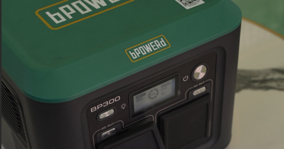 Solar charged portable battery units displayed at bPOWERd rental station in Lagos Nigeria