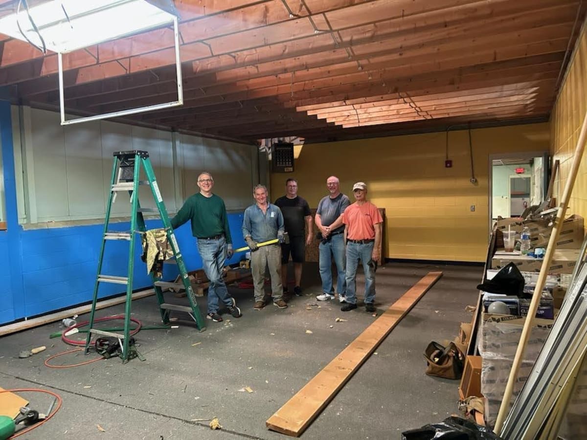 Knights of Columbus volunteers standing together during Holy Name Catholic School renovation project