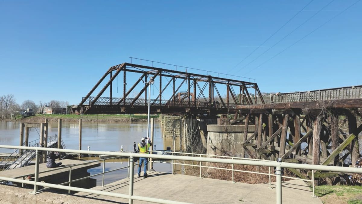Volunteers Crank 12-Person Bridge for Historic Inspection - Image 3
