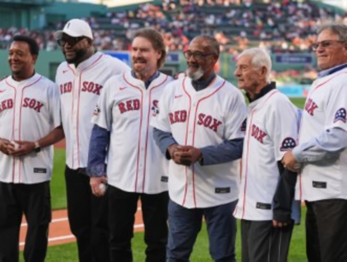 ** Wade Boggs celebrates with Pedro Martinez, David Ortiz and other Red Sox legends at Fenway Park