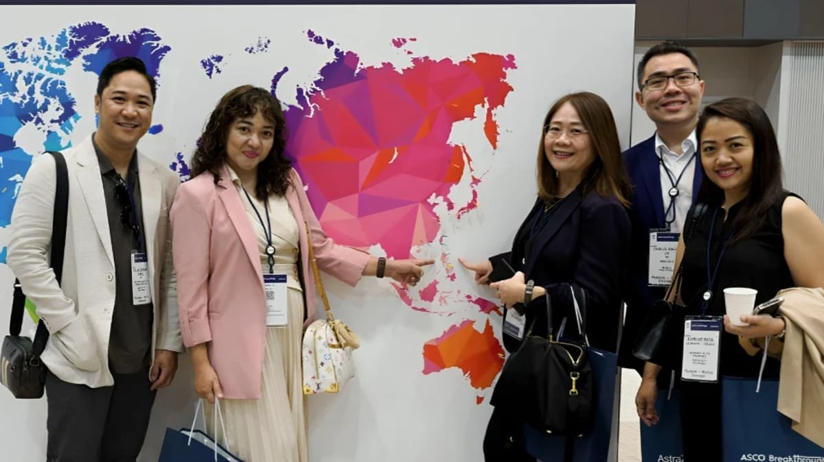 Medical professionals and cancer researchers collaborating together at international oncology conference in Singapore