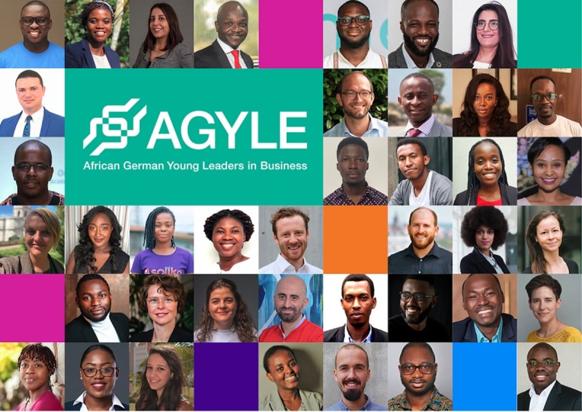 Young diverse entrepreneurs collaborating on sustainable technology projects in modern Berlin workspace