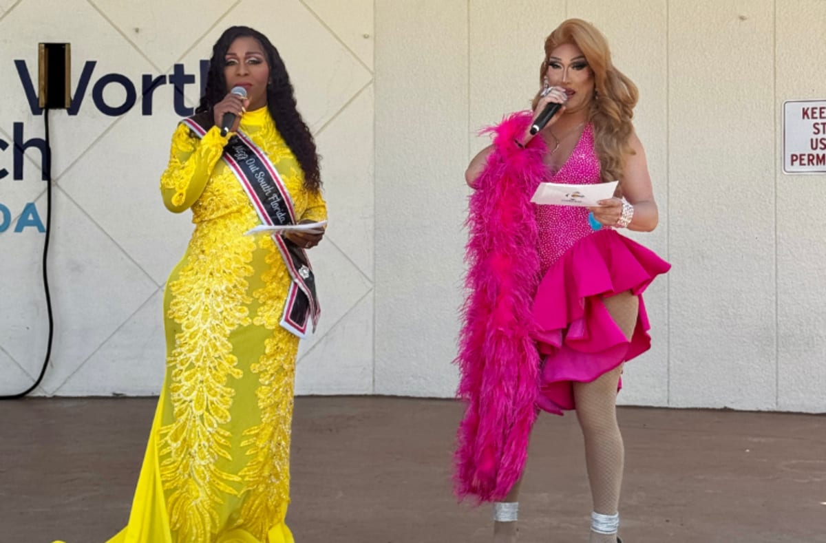 Colorful Pride festival at Bryant Park with vendors, families, and rainbow flags celebrating community