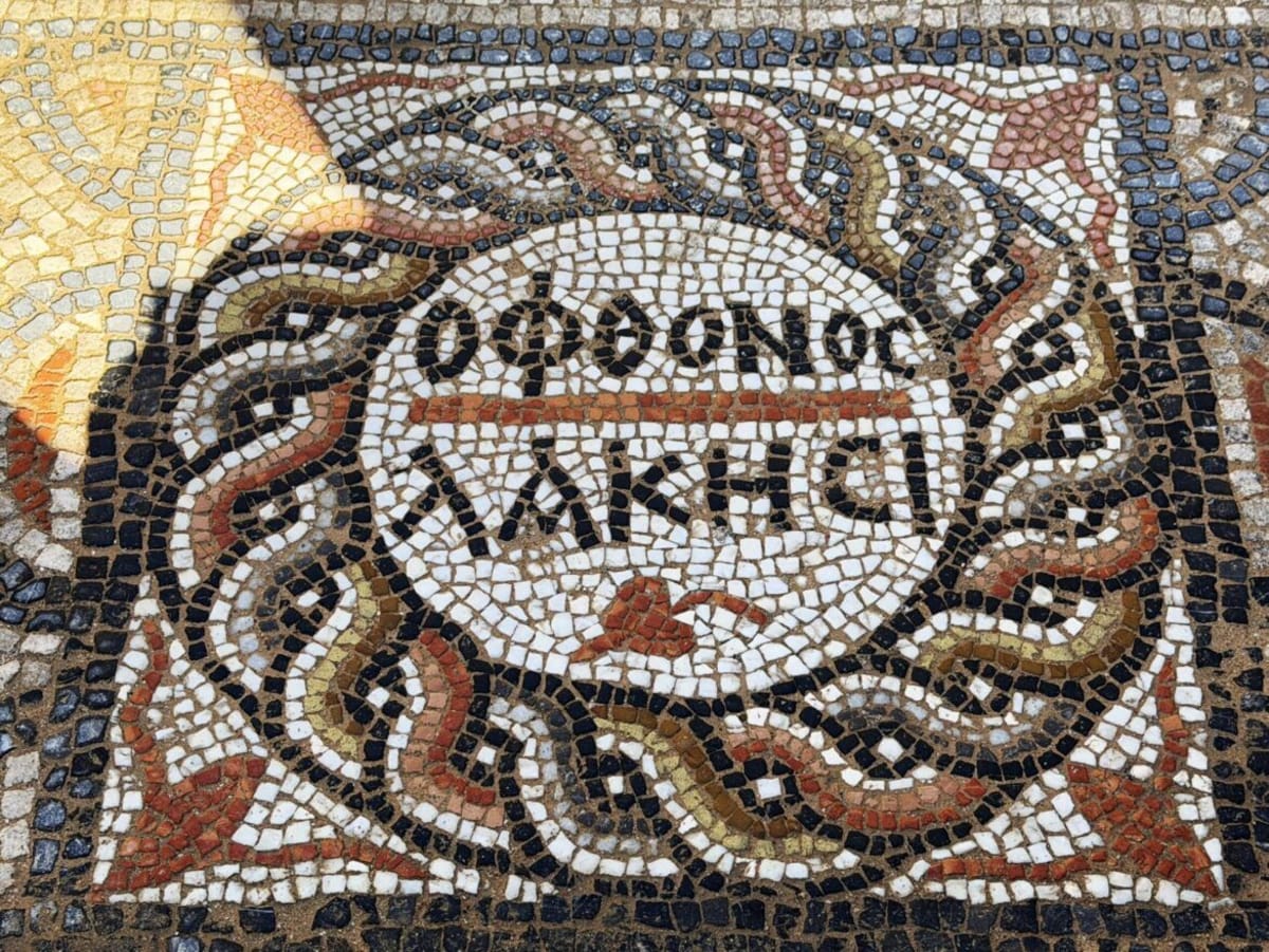 Ancient Mosaic in Turkey Reads: "Let the Envious Burst