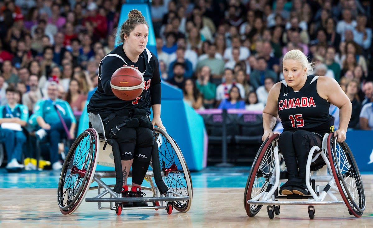 Canadian women's wheelchair basketball team competing at Ottawa Invitational tournament before home crowd