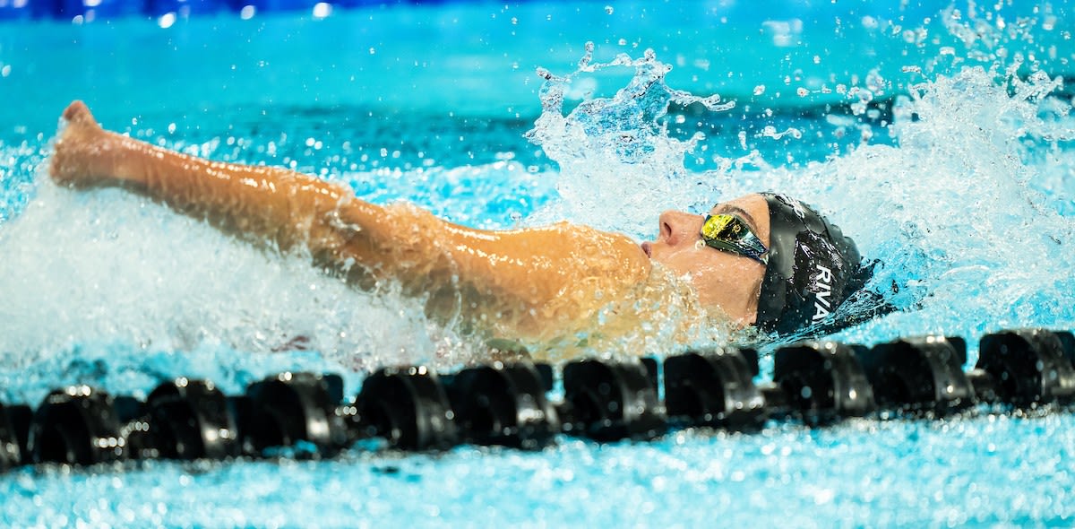 ** Canadian Para swimmers competing in pool during international championship competition event