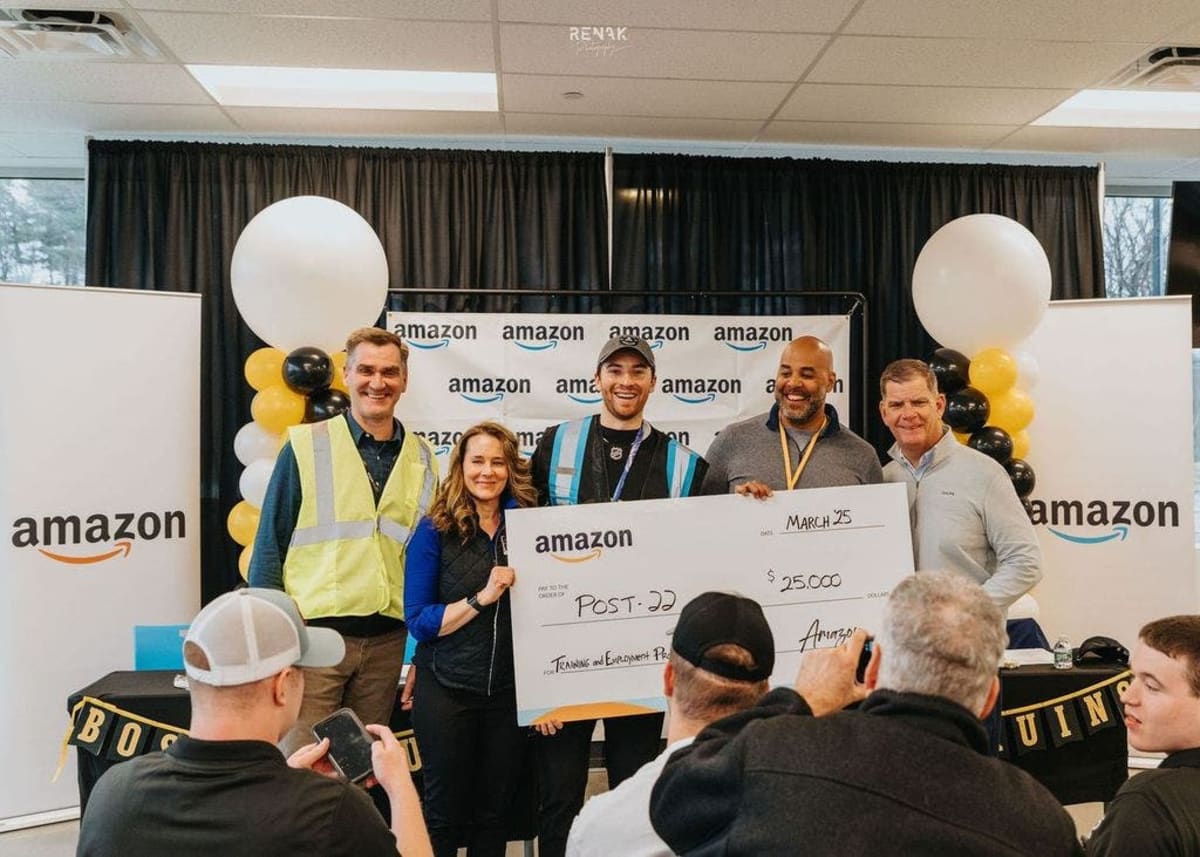 Olympic Gold Medalist Signs Amazon Packages in MA - Image 5