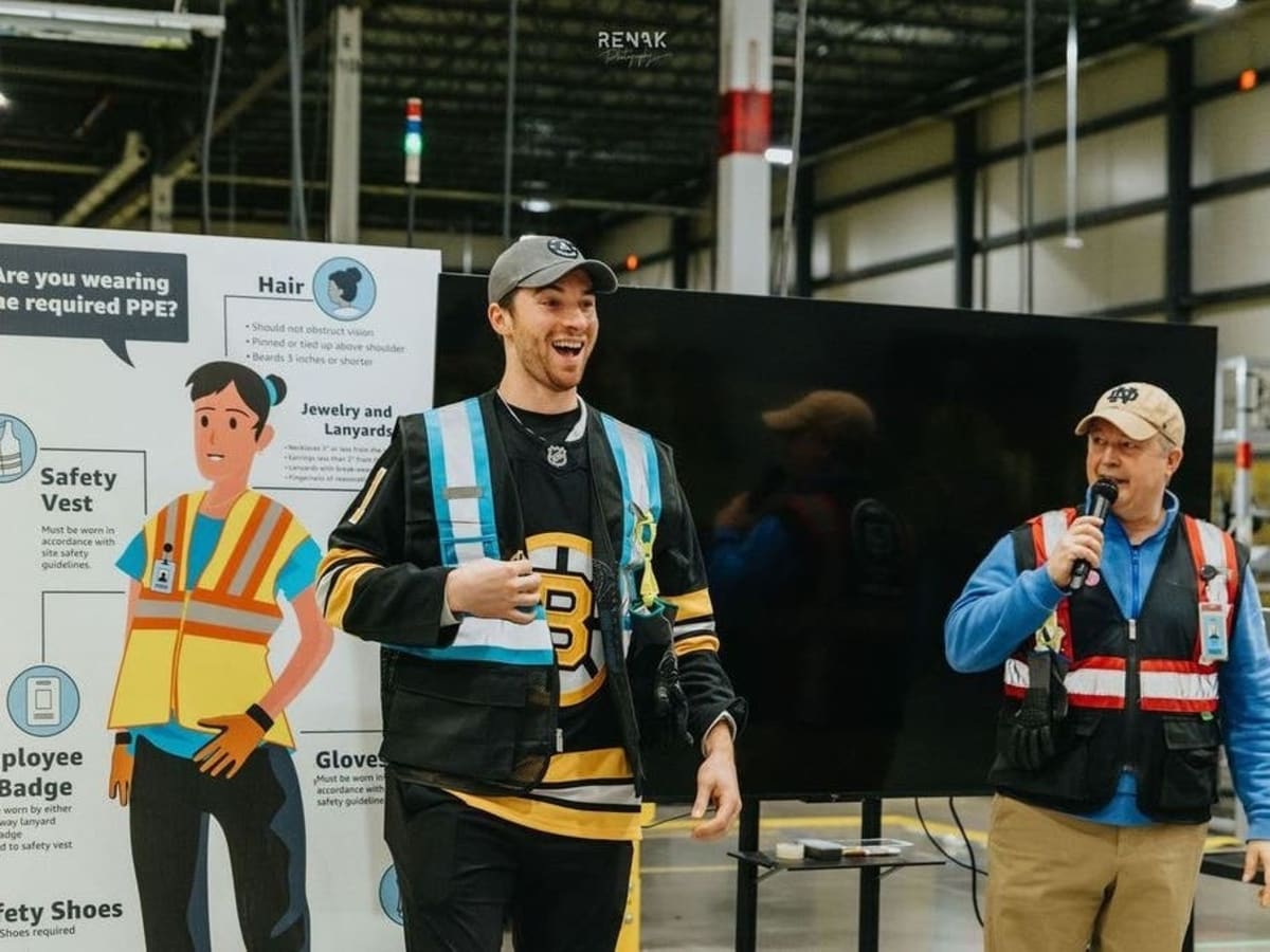 Olympic Gold Medalist Signs Amazon Packages in MA