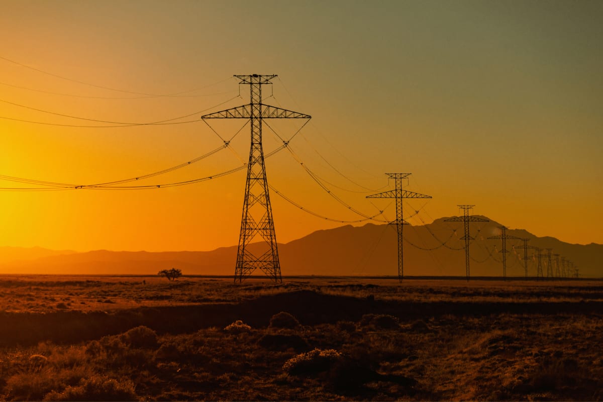 ** Clean energy transmission infrastructure delivering renewable power across American landscape