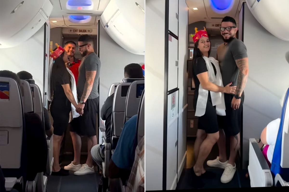 Bride in makeshift toilet paper dress holding coffee stirrer bouquet on airplane aisle