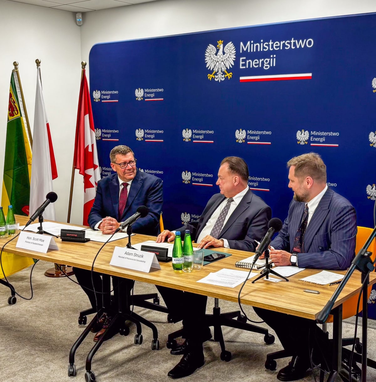 Saskatchewan Premier Scott Moe and Polish officials signing nuclear energy partnership agreement at ceremony