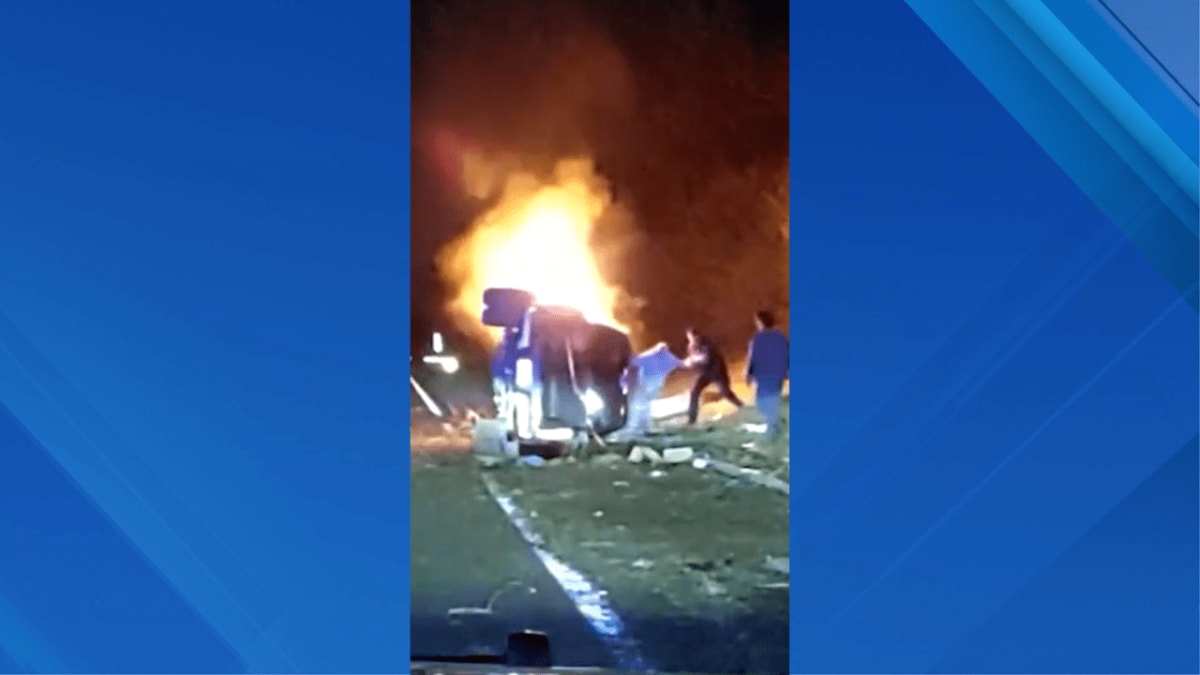 Officer Pulls Driver from Burning Car Through Sunroof