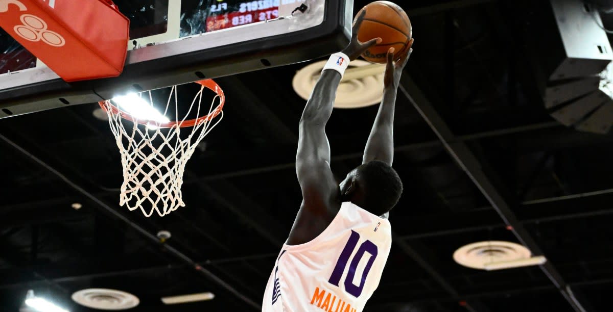 Phoenix Suns young players celebrating together during their Summer League comeback victory
