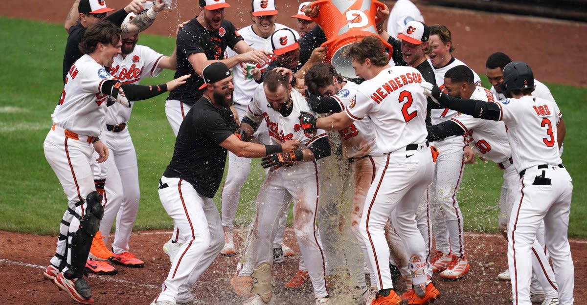 ** Colton Cowser celebrates after hitting game-winning home run for Baltimore Orioles at Camden Yards