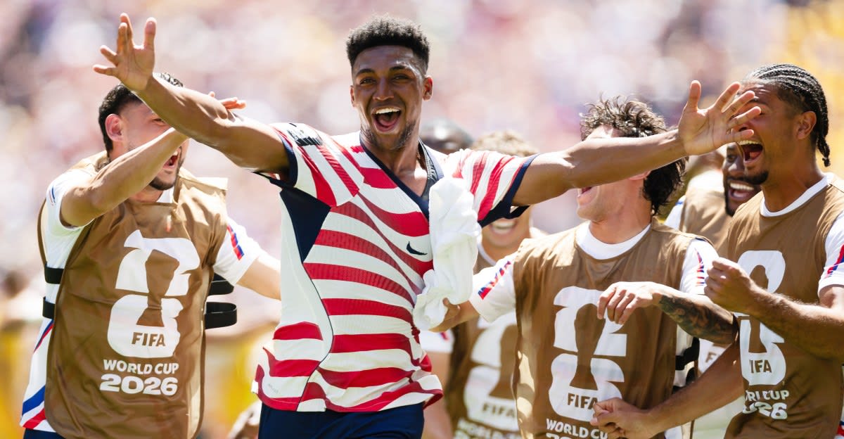 Alex Freeman celebrates with USA teammates after scoring second goal against Australia in Seattle