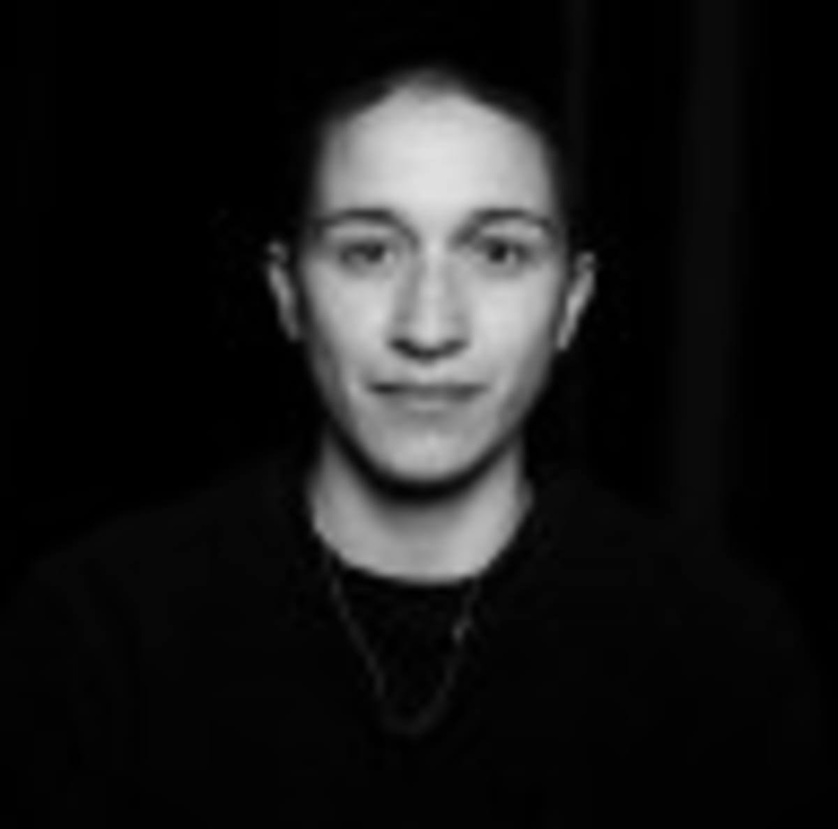 Person tuning up bicycle while managing chronic illness with fitness tracker technology