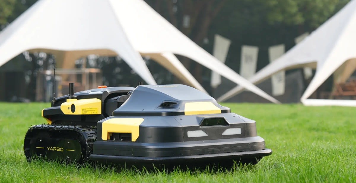 Yarbo autonomous robot lawn mower on grass demonstrating updated security features