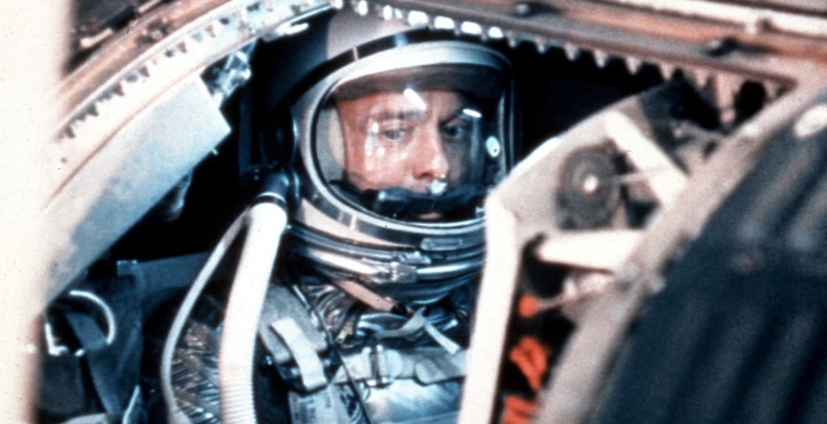 Astronaut Alan Shepard in silver pressure suit during pre-flight testing in 1961