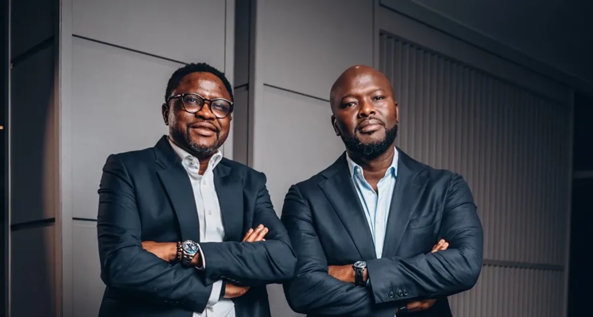 African entrepreneurs collaborating on technology startup in modern co-working space