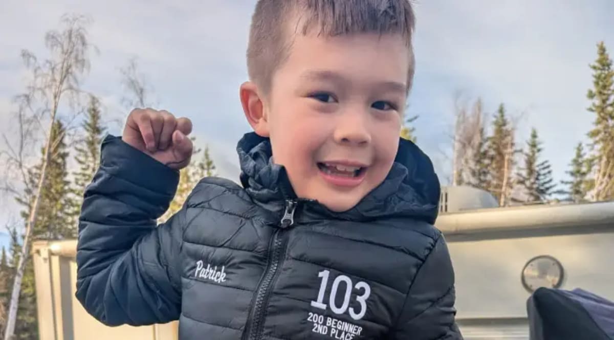 Seven-year-old Patrick smiling, the Texas boy who rescued his baby brother from drowning