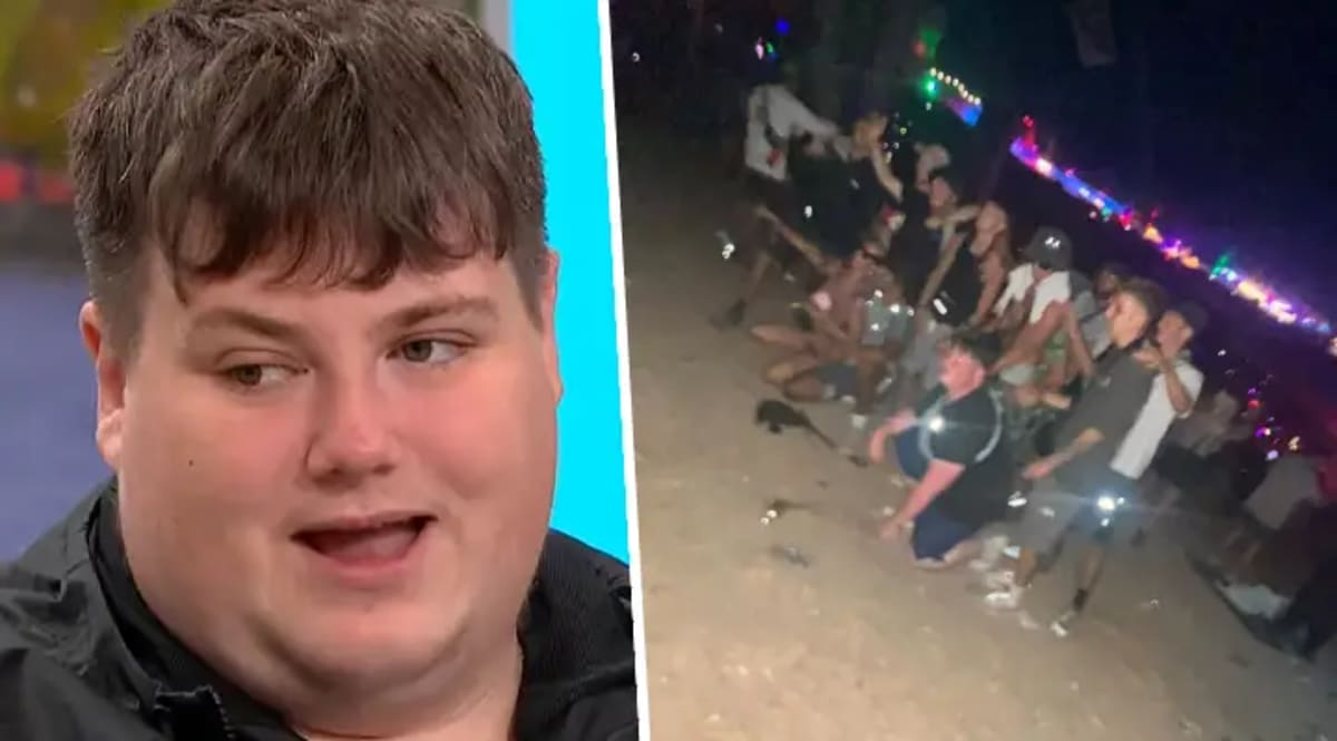 Young man with autism smiling with group of friends at outdoor music festival