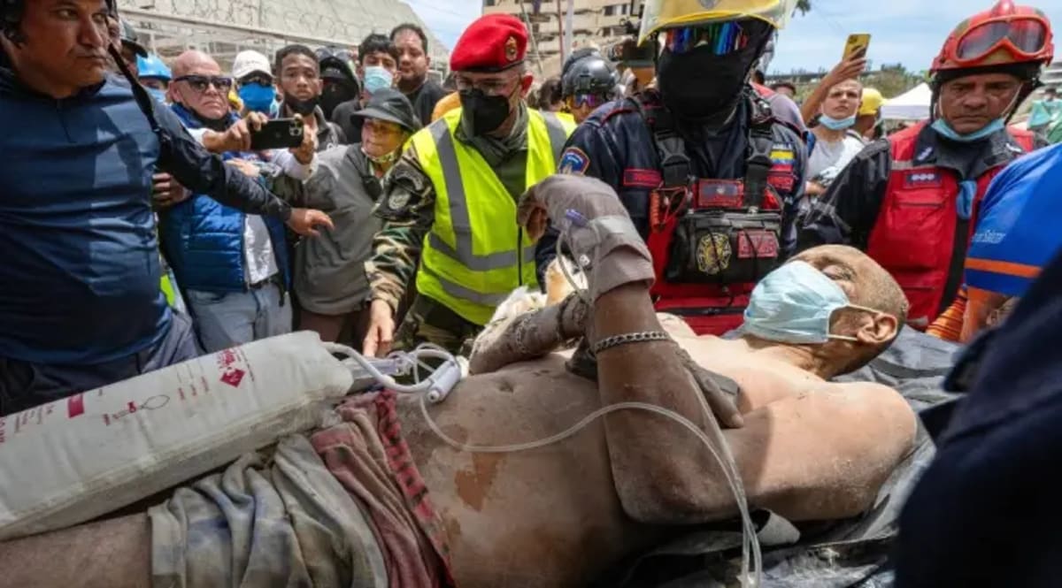 Virginia Task Force 1 rescue workers searching through concrete rubble in Venezuela earthquake zone