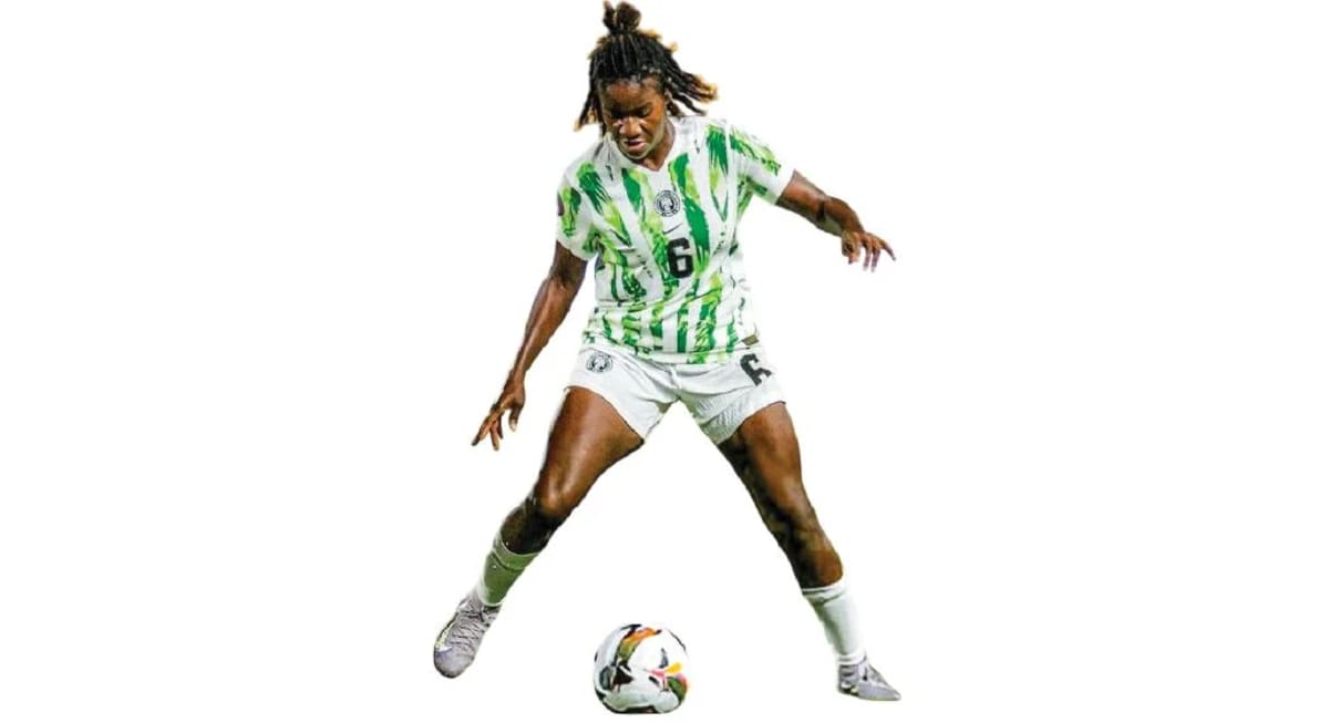 Esther Okoronkwo, Nigerian Super Falcons midfielder, in team uniform on soccer field