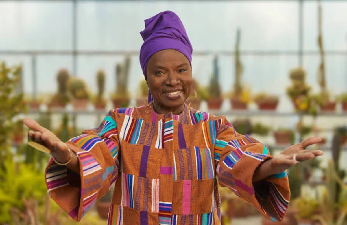 Angelique Kidjo smiling at camera, Grammy-winning musician from Benin making Hollywood history