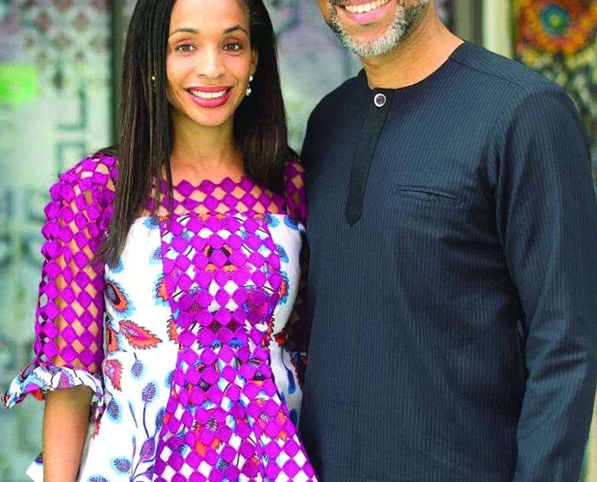 Ndidi Nwuneli smiling with family members at a celebration, showing warmth and connection